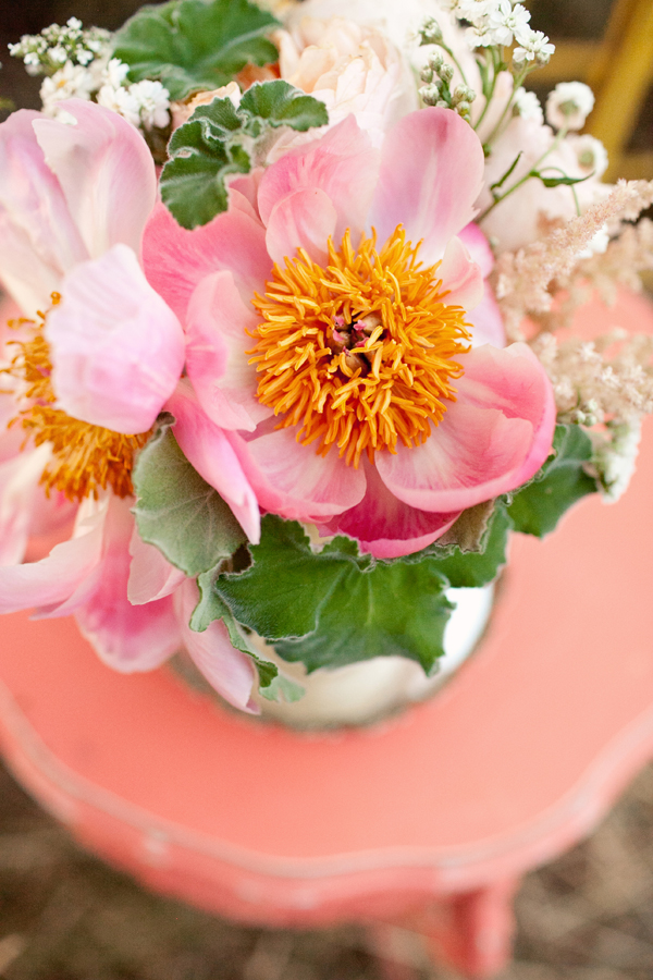 Vibrant pink and orange floral decor - Photo by Studio 6.23